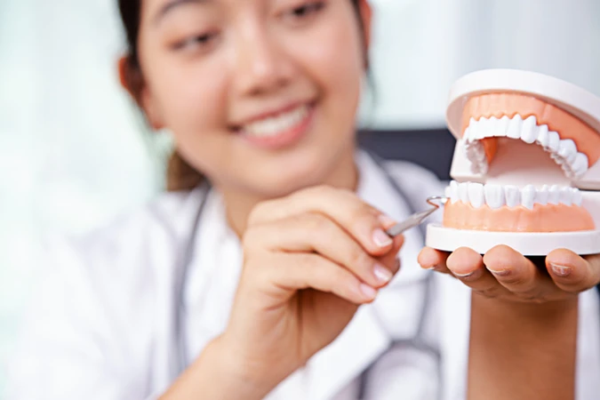 Crown Porcelain Fused to Metal (PFM) + Perawatan Restorasi Gigi di Tidi Dental Clinic